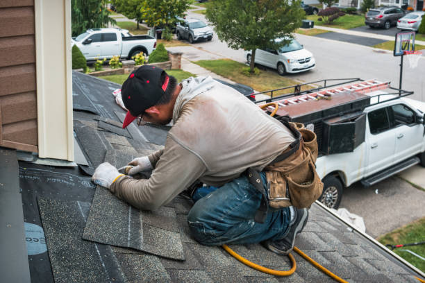 Professional Roofing technician working in Ludington, MI